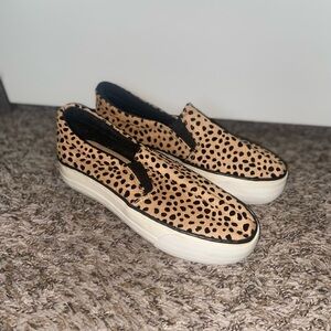 Restricted leopard print slip-on sneakers